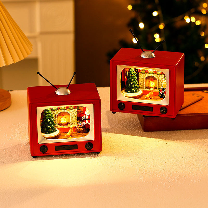 Luminous Spinning TV Music Box – Christmas Desktop Ornament & Festive Gift