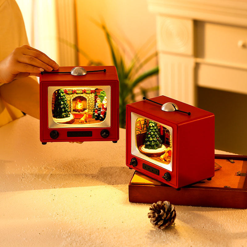 Luminous Spinning TV Music Box – Christmas Desktop Ornament & Festive Gift