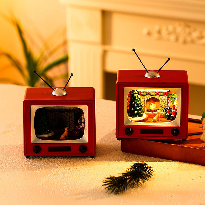 Luminous Spinning TV Music Box – Christmas Desktop Ornament & Festive Gift